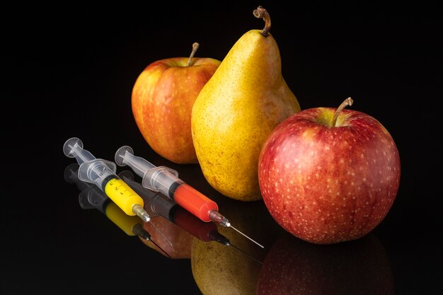 Delicious fruit and syringes