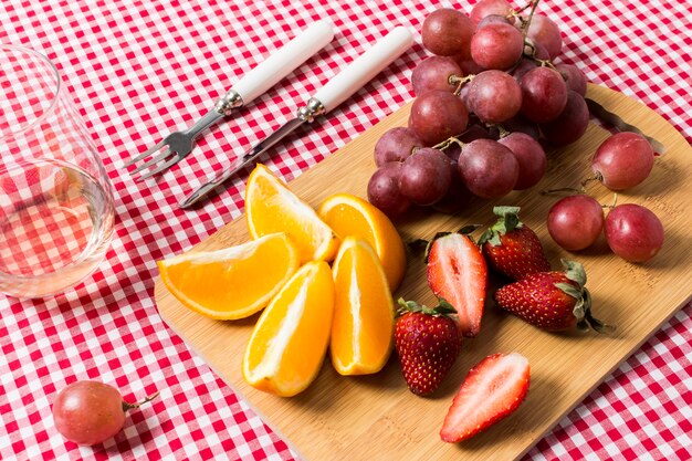 Delicious fruits on kitchen cloth 