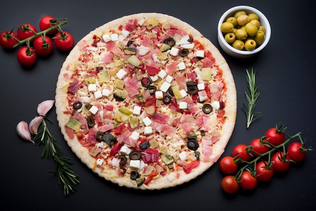 Delicious garnish pizza with various ingredients