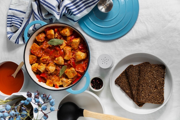 Delicious goulash on table still life above view