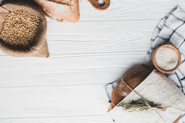 Delicious grains and bread on table