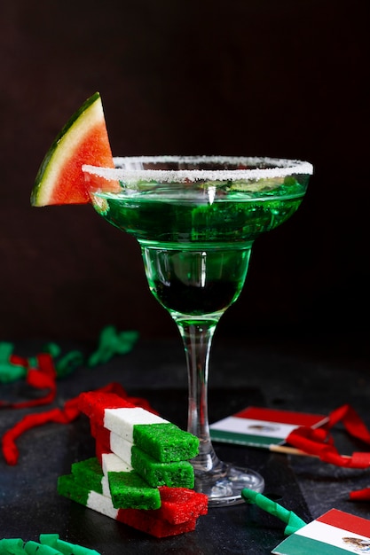 Delicious green drink with melon for mexican party