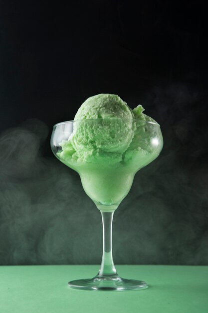 Delicious green ice cream still life