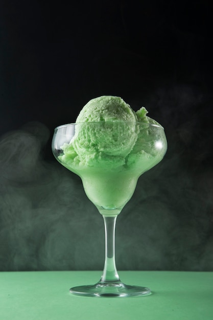 Delicious green ice cream still life