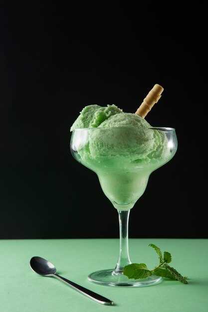 Delicious green ice cream still life