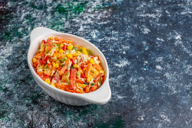 Delicious healthy bell pepper salad with chicken,top view