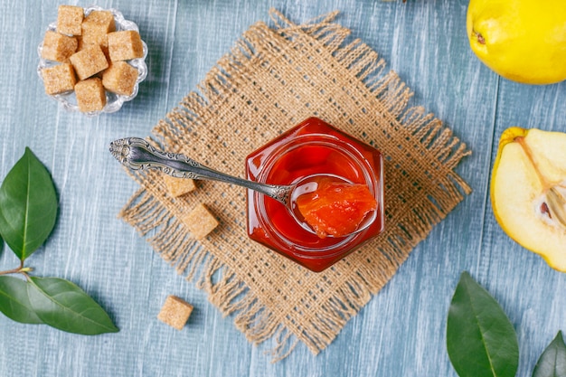 Delicious and healthy homemade quince jam in glass