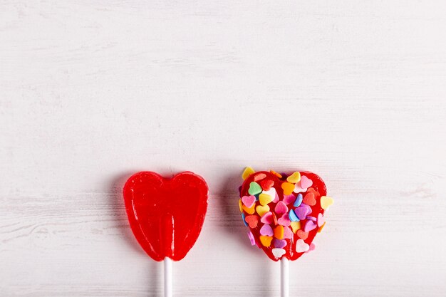 Delicious heart lollipops with copy space
