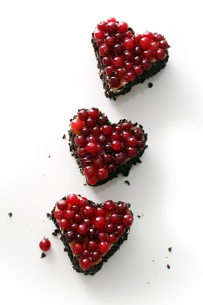 Delicious heart-shaped pie on the table