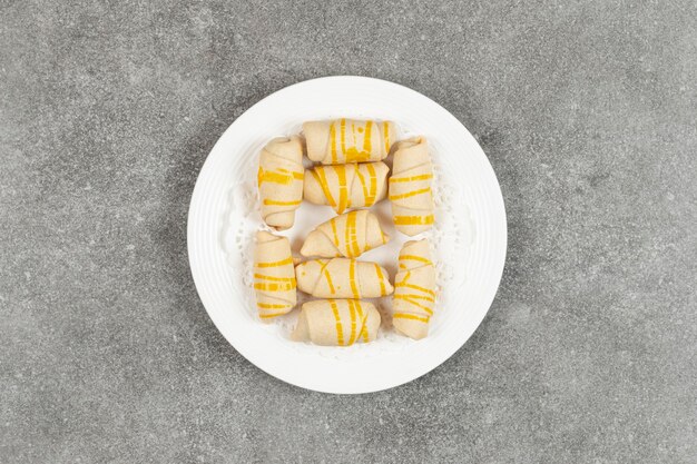 Delicious homemade biscuits on white plate