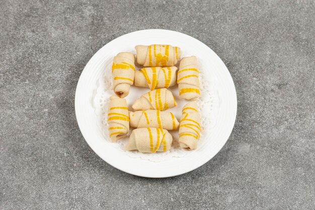 Delicious homemade biscuits on white plate