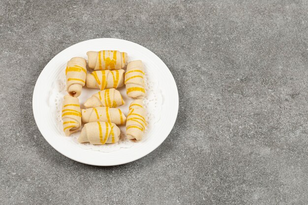 Delicious homemade biscuits on white plate