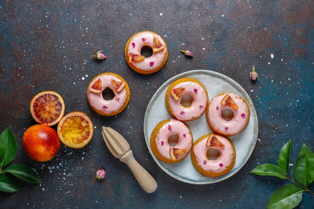 Delicious homemade blood orange glaze donuts.