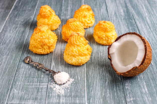 Delicious homemade coconut macaroons with fresh coconut, top view