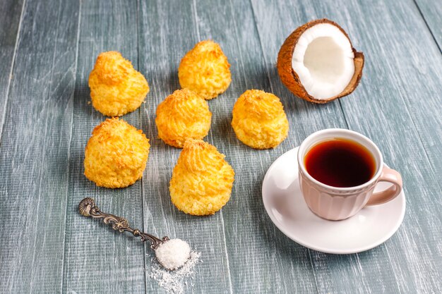 Delicious homemade coconut macaroons with fresh coconut, top view