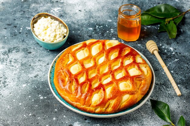 Delicious homemade cottage cheese pie tart with fresh cottage cheese and honey