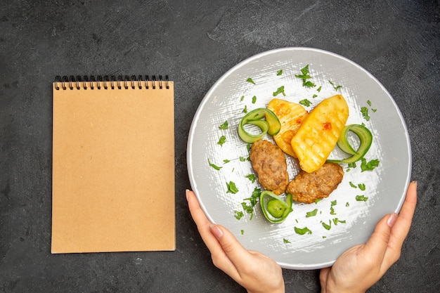 Delicious homemade cutlet meal along with potatoes