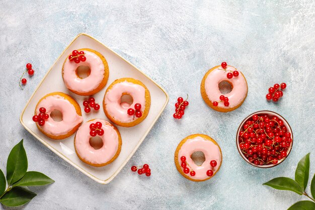 Delicious homemade red currant glaze donuts.