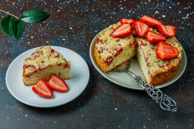 Delicious homemade strawberry crumble cake with fresh strawberry slices