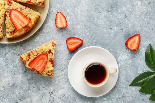 Delicious homemade strawberry crumble cake with fresh strawberry slices