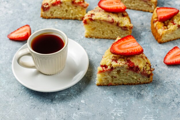 Delicious homemade strawberry crumble cake with fresh strawberry slices