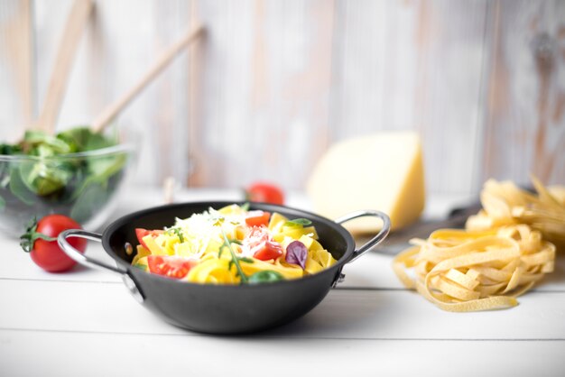 Delicious italian homemade spaghetti on wooden desk