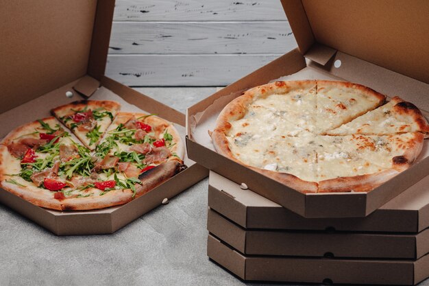 Delicious italian pizza in pizza box