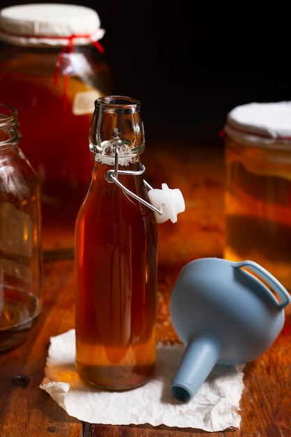 Free photo delicious kombucha bottle still life