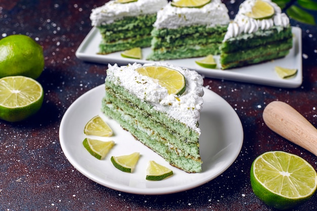 Delicious lime cake with fresh lime slices and limes