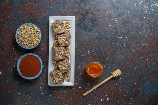 Delicious marble halva with sunflower seeds,cocoa powder and honey,top view