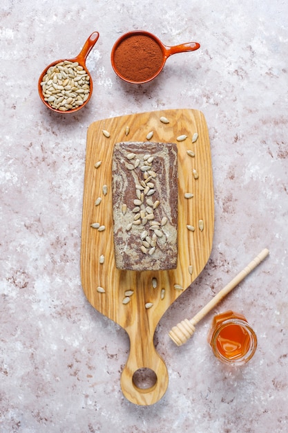 Delicious marble halva with sunflower seeds,cocoa powder and honey