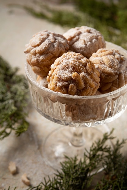 Free photo delicious marzipan in cup high angle