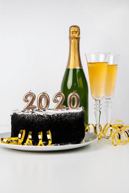 Delicious midnight cake and beverage 2020 new year digits