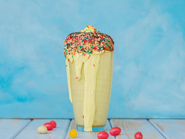 Delicious milkshake with sweets