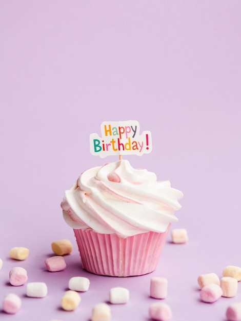 Delicious muffin with happy birthday sign