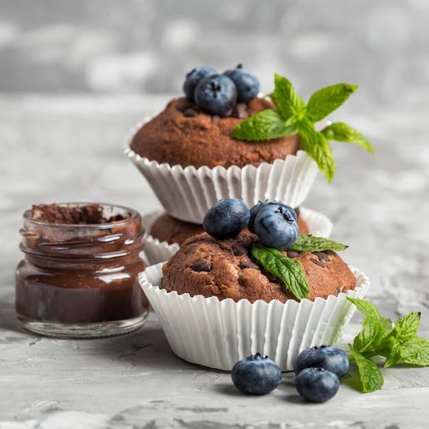 Delicious muffins with chocolate and fruit