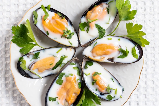 Delicious mussel shells on a plate