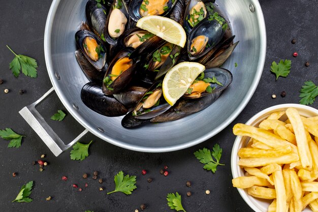 Delicious mussel shells with french fries