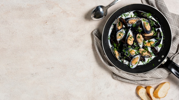 Delicious mussels and parsley with copy space