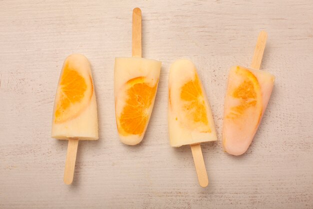 Delicious orange ice cream pop stickles