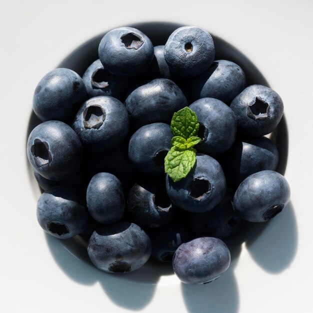 Delicious organic blueberries and mint leaf
