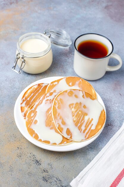 Delicious pancakes with condensed milk.