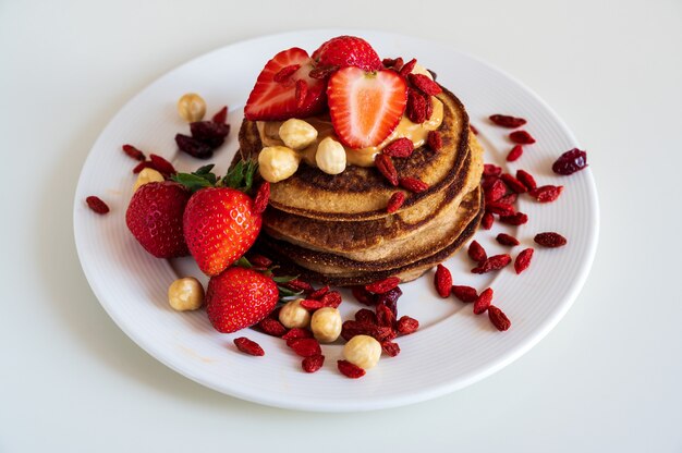 Delicious pancakes with strawberries