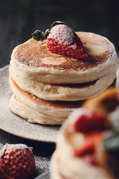 Delicious pancakes with strawberries