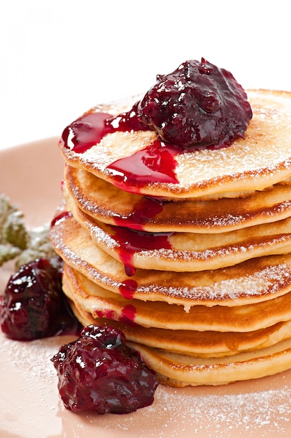 Delicious pancakes with strawberry jam