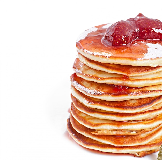 Delicious pancakes with strawberry jam