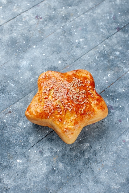 delicious pastry star shaped on grey desk, sweet bake pastry cake