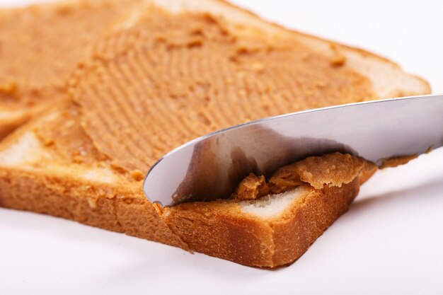 Delicious peanut butter on the table