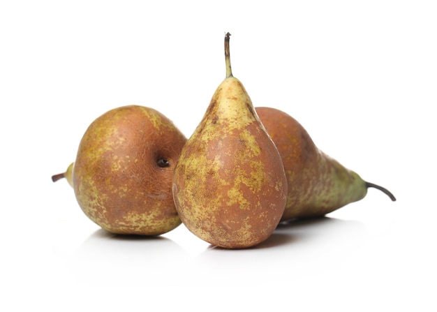 Delicious pears on a white surface