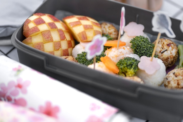 Delicious picnic with cherry tree flowers